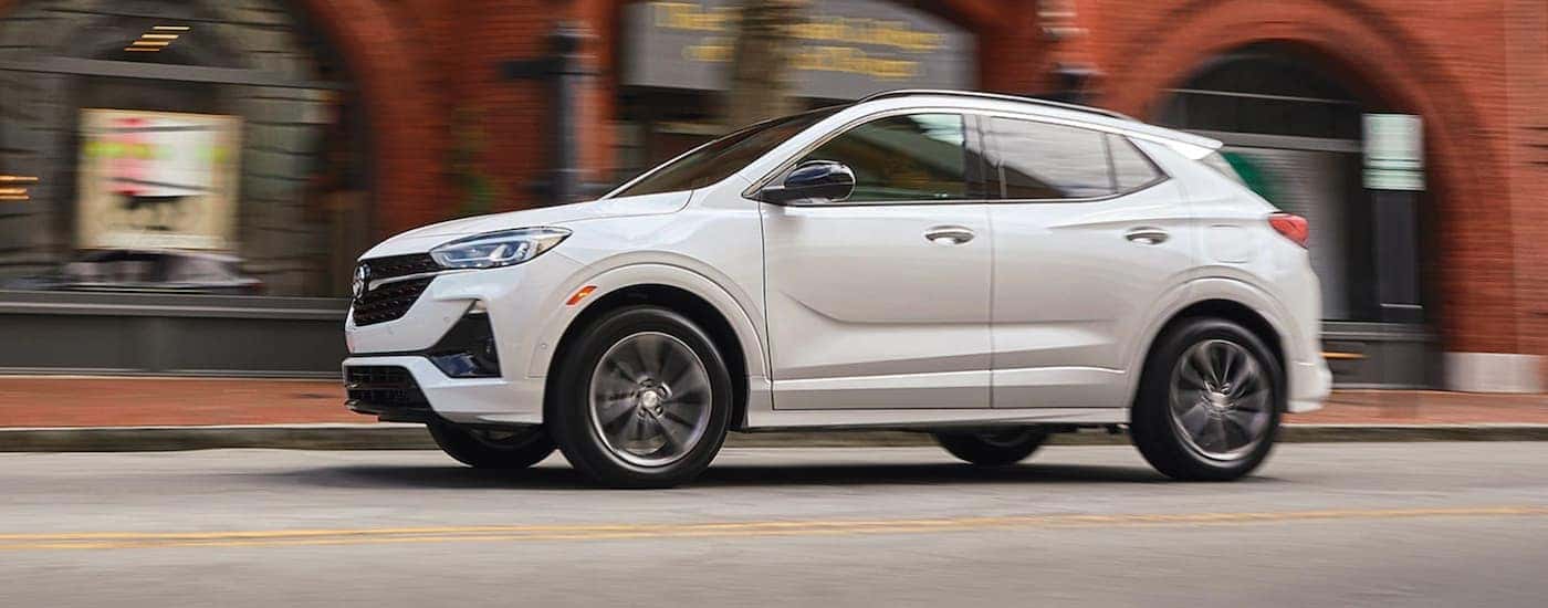 A white 2021 Buick Encore GX is shown from the side.