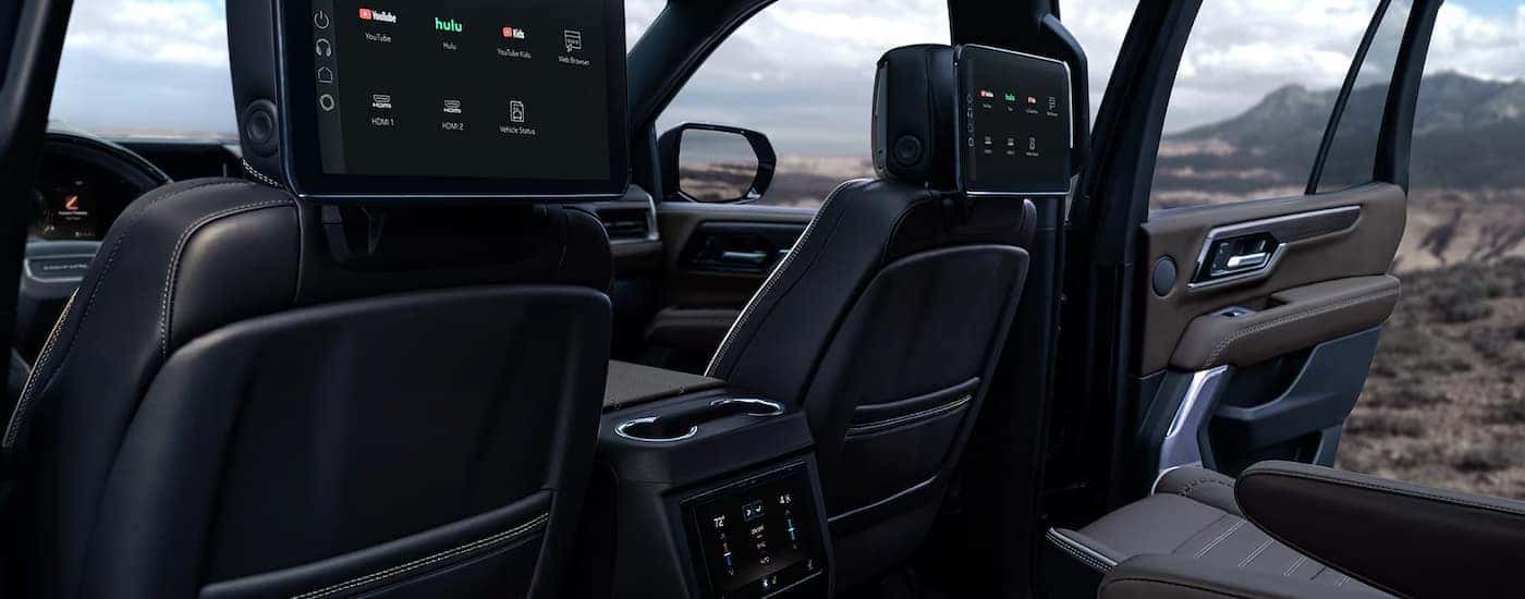 The rear seating entertainment screens in a 2025 GMC Yukon.
