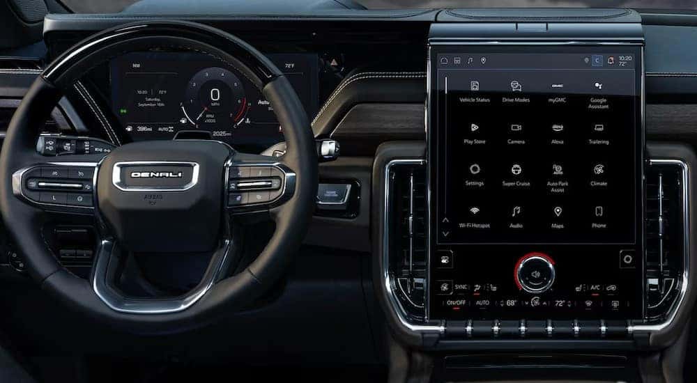 A close-up of the black dash is shown in a 2025 GMC Yukon XL.