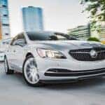 A silver 2018 Buick LaCrosse from the front after leaving a used Buick dealer.