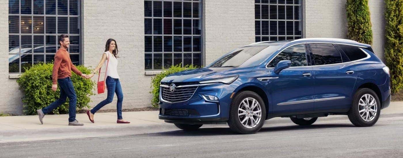 A blue 2024 Buick Enclave is shown from the side after leaving a Buick dealer near Easley.