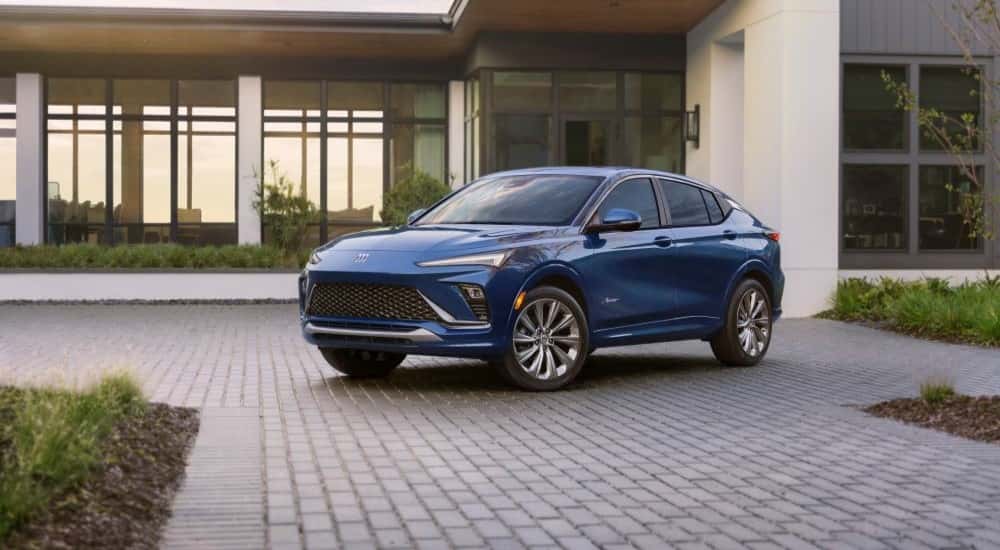 A blue 2025 Buick Envista Avenir parked in a driveway