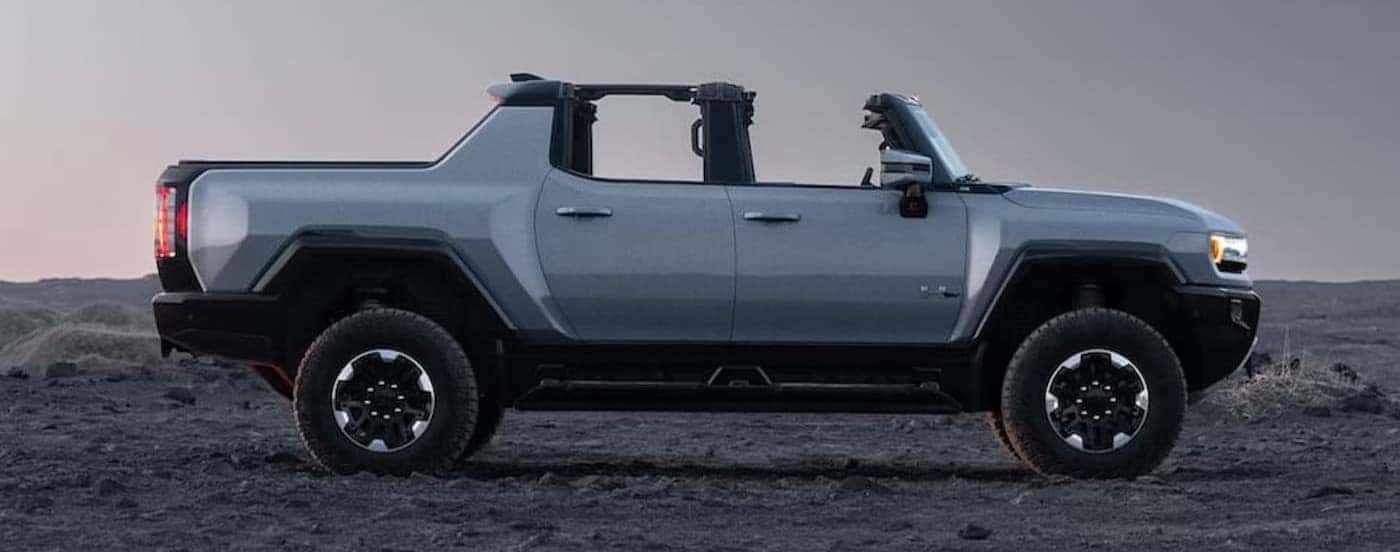A parked gray 2025 GMC Hummer EV for sale near Anderson.