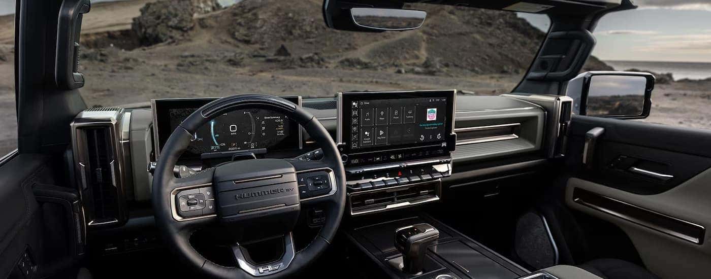 Infotainment and digital gauge cluster on a 2025 GMC Hummer EV for sale near me