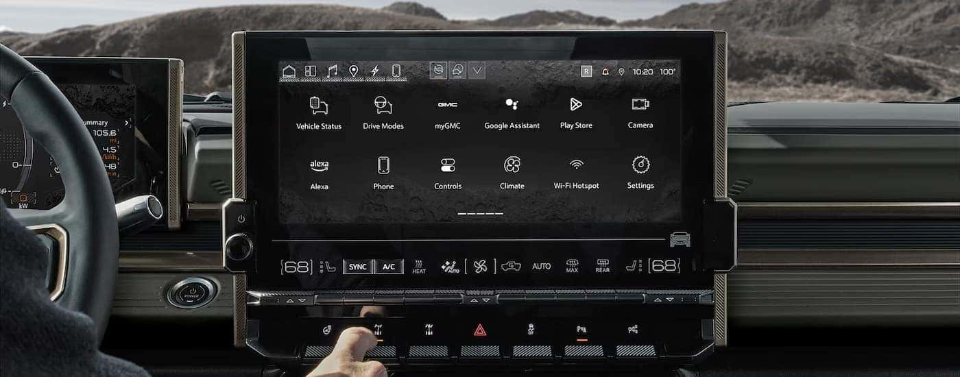 Infotainment and digital gauge cluster on a 2025 GMC Hummer EV for sale near Greer