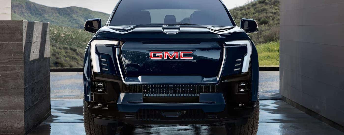 A black 2025 GMC Sierra EV Elevation parked for sale