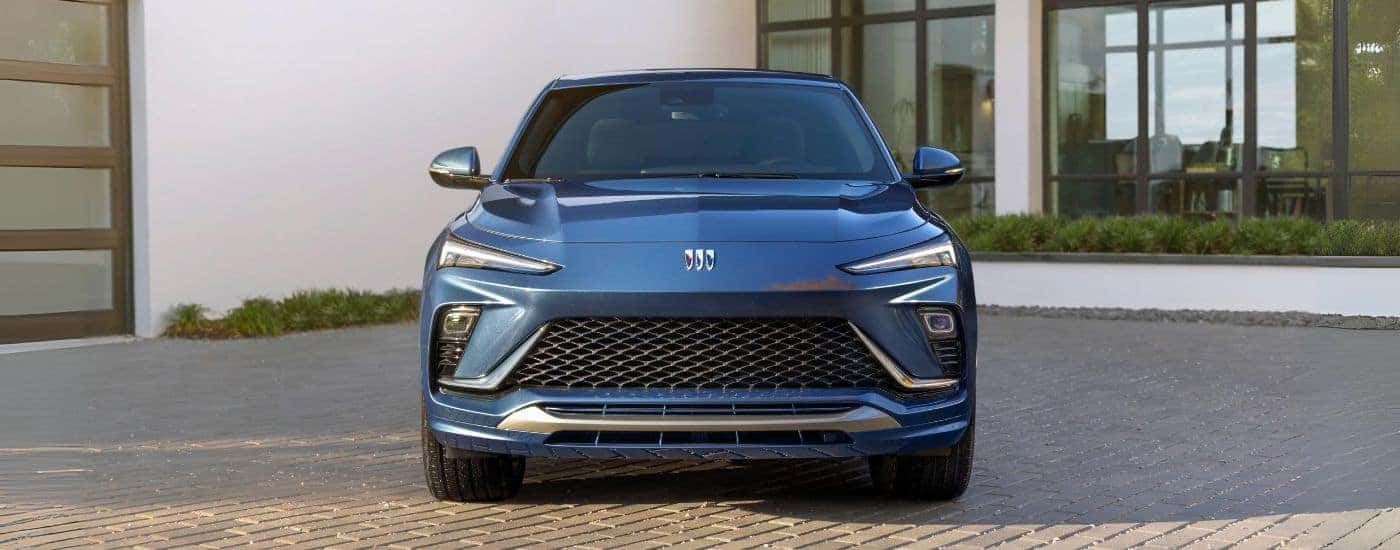 Blue 2024 Buick Envista Avenir parked head on