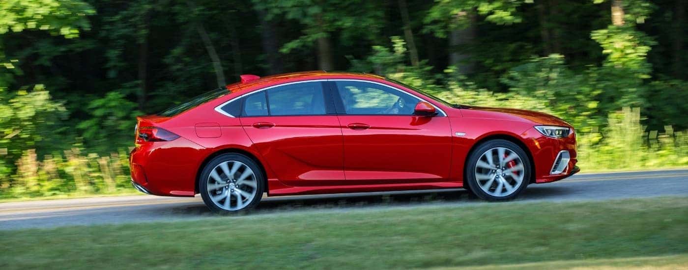 Red 2019 Buick Regal GS driving on an open road