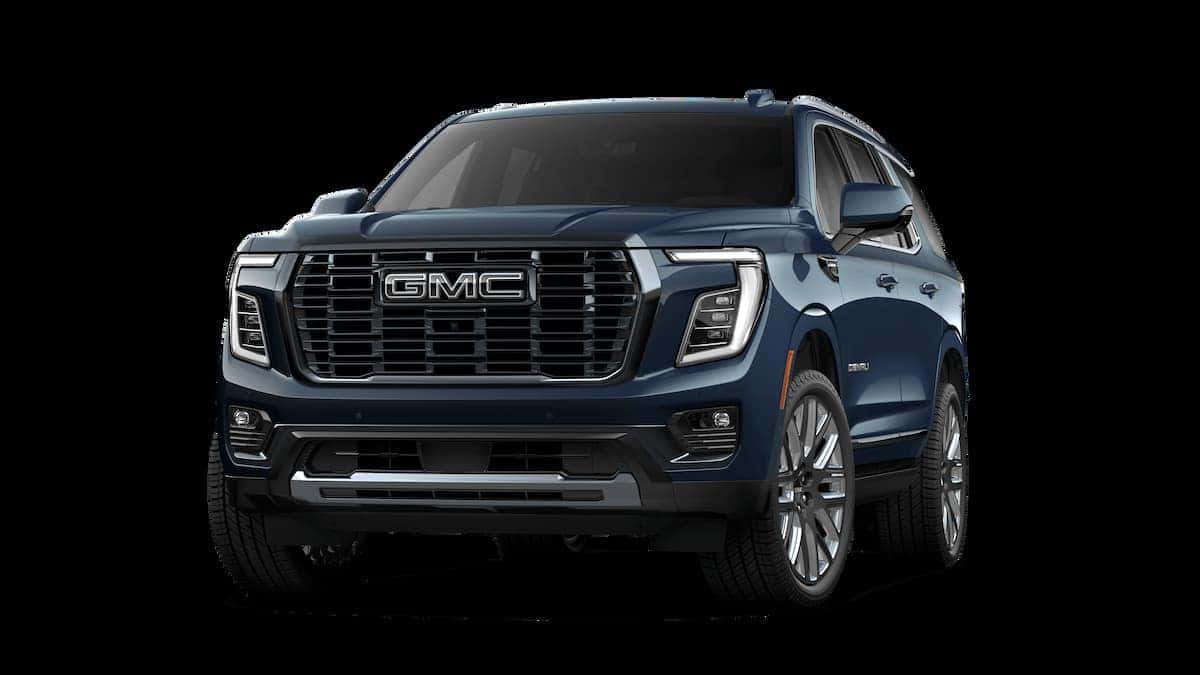 2025 GMC Yukon Dark Blue against a black background