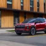 A red 2025 Chevy Equinox RS for sale is shown from the front at an angle.