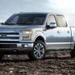 A silver 2015 Ford F-150 after leaving a dealer with used trucks for sale in Tomball.