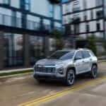 A grey 2025 Chevy Equinox for sale near Houston from the front.