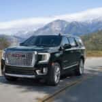 A black 2022 GMC Yukon from the front.