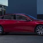 Red 2019 Chevy Malibu parked outside a building after visiting a dealer with used cars for sale near Houston.