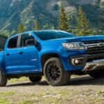 A blue 2022 Chevy Colorado is shown from the front at an angle.