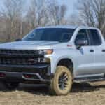 A grey 2020 Chevy Silverado Z71 Trail Boss is shown from the front at an angle.