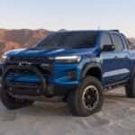 A blue 2023 Chevy Colorado ZR2 is shown from the front at an angle.