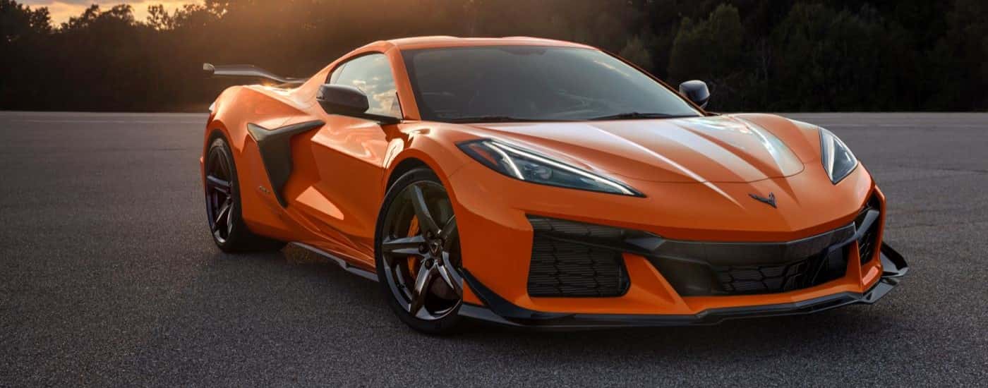 An orange 2023 Chevy Corvette Z06 parked on asphalt