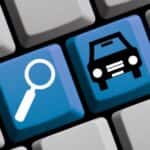 A blue car and blue search button are shown on a keyboard.