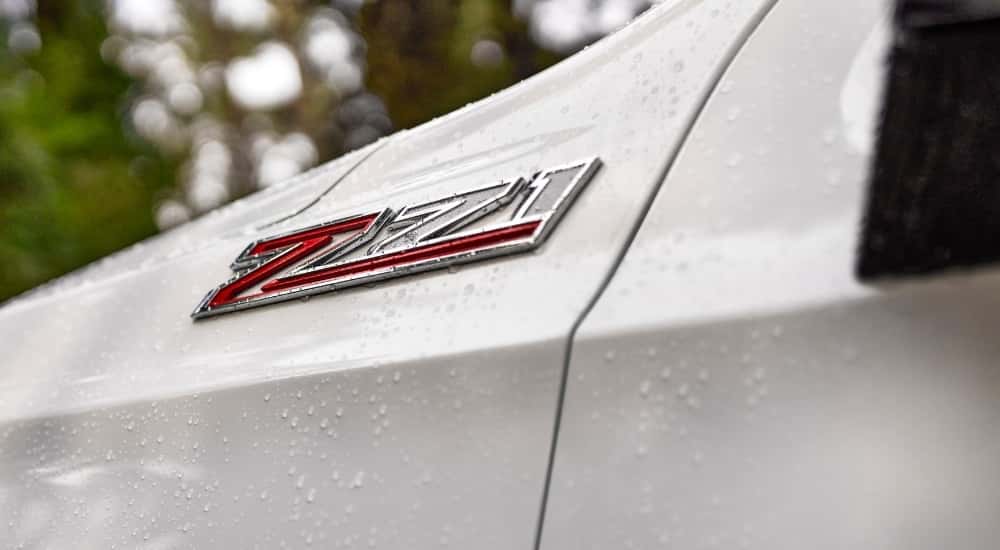 Close-up of the Z71 badge in a white 2023 Chevy Tahoe Z71