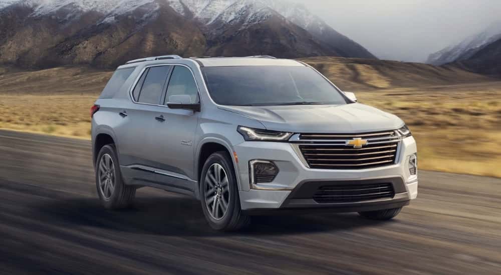Silver 2022 Chevy Traverse driving on a highway