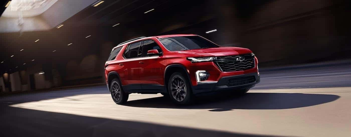 Red 2023 Chevy Traverse for sale near Houston on a test drive