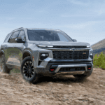 Silver 2026 Chevy Traverse Z71 driving on a trail