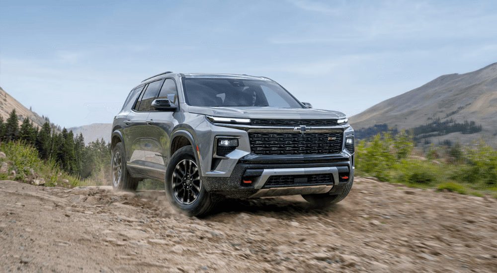 Silver 2026 Chevy Traverse Z71 driving on a trail