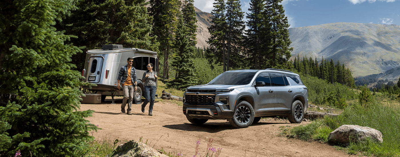 Silver 2026 Chevy Traverse parked on campground