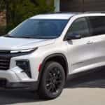 A white 2026 Chevy Traverse parked on a driveway.
