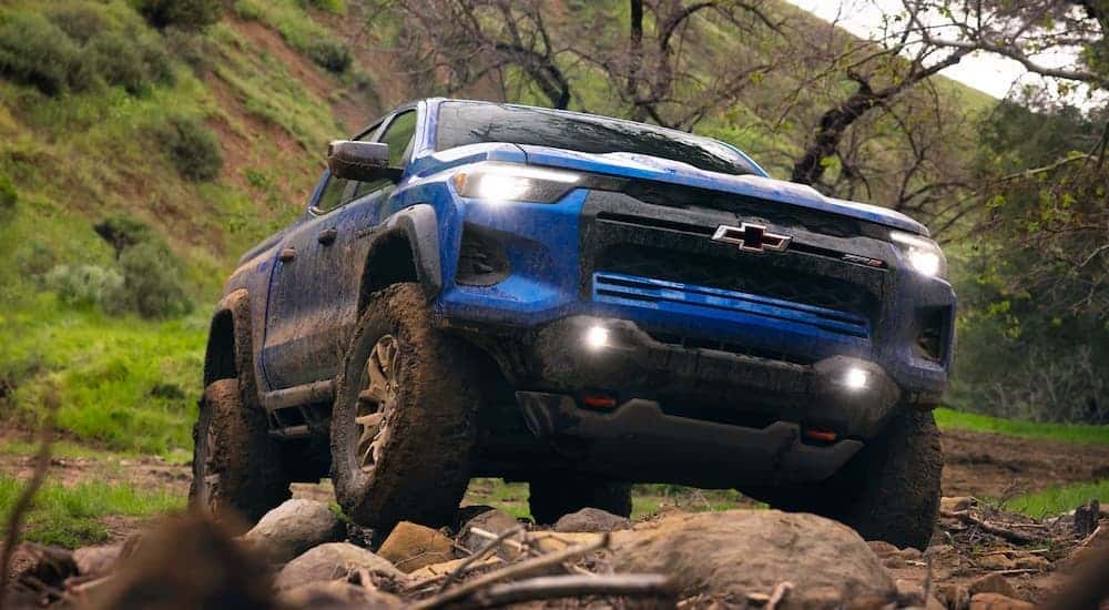 A blue 2026 Chevy Colorado ZR2 parked off-road.