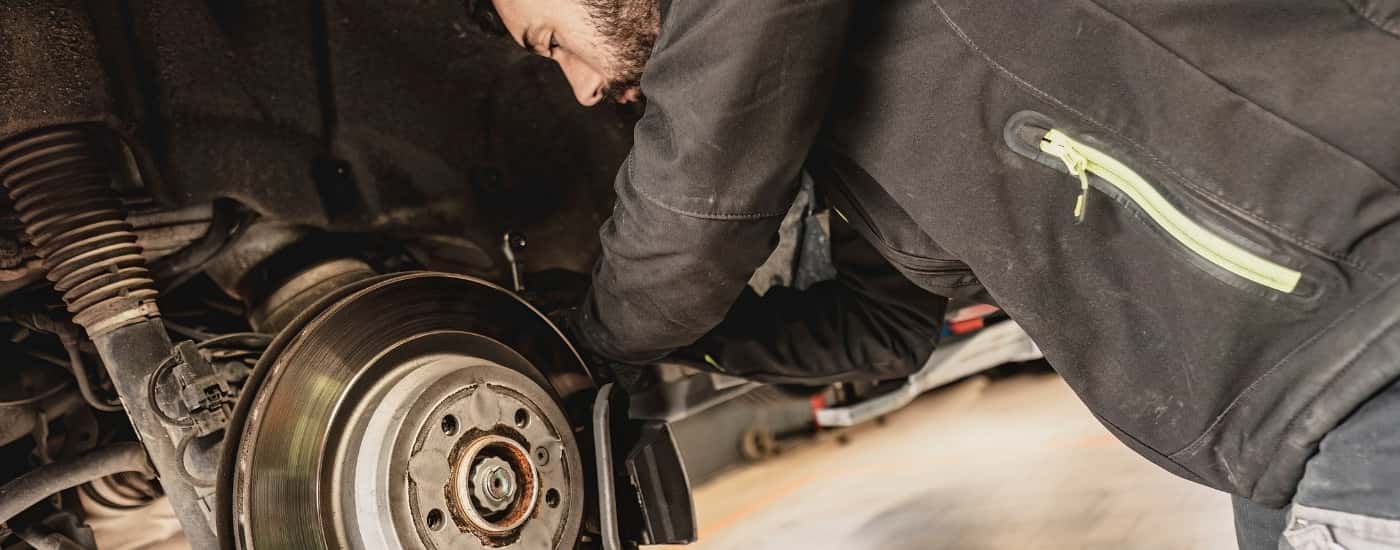 A mechanic performing brake service