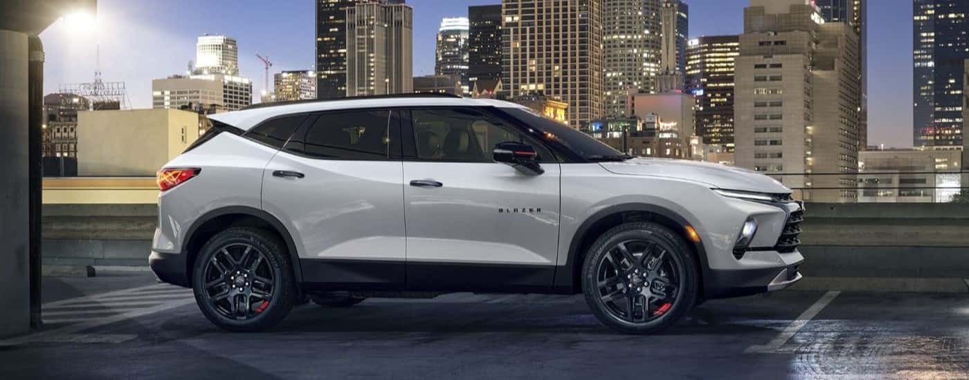 White 2024 Chevy Blazer going to see used SUVs for sale near Houston