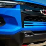 Close up of the grille on a blue 2026 Chevy Colorado.