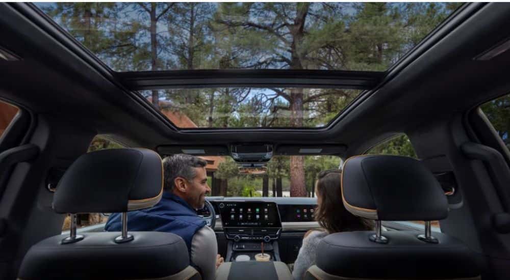 The interior of a 2027 Chevy Silverado 1500 with the panoramic moonroof.