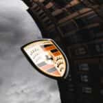 Porsche emblem on car hood