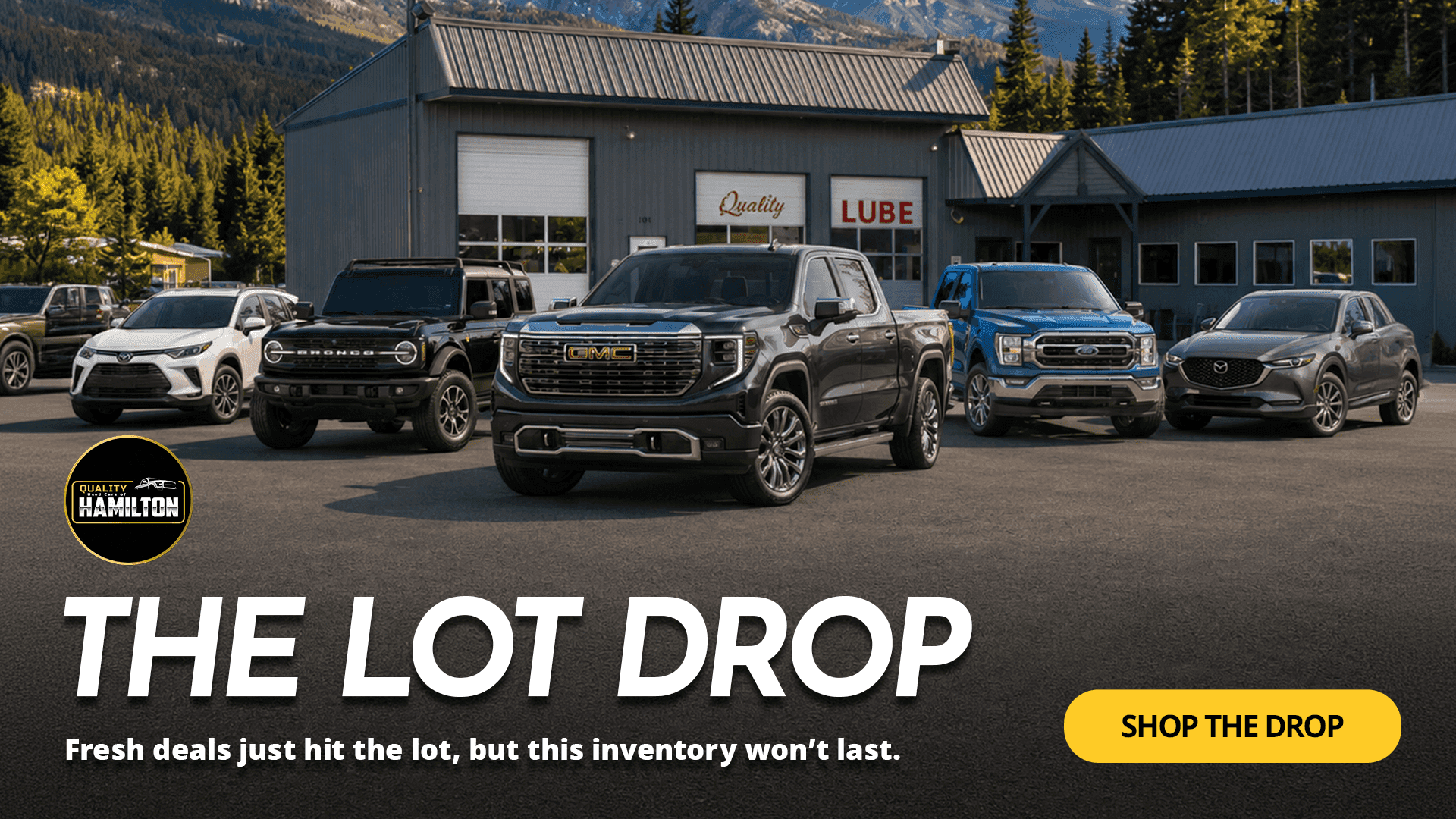 Quality Used Cars of Hamilton Lot Drop banner featuring a selection of used cars, SUVs, and trucks.
