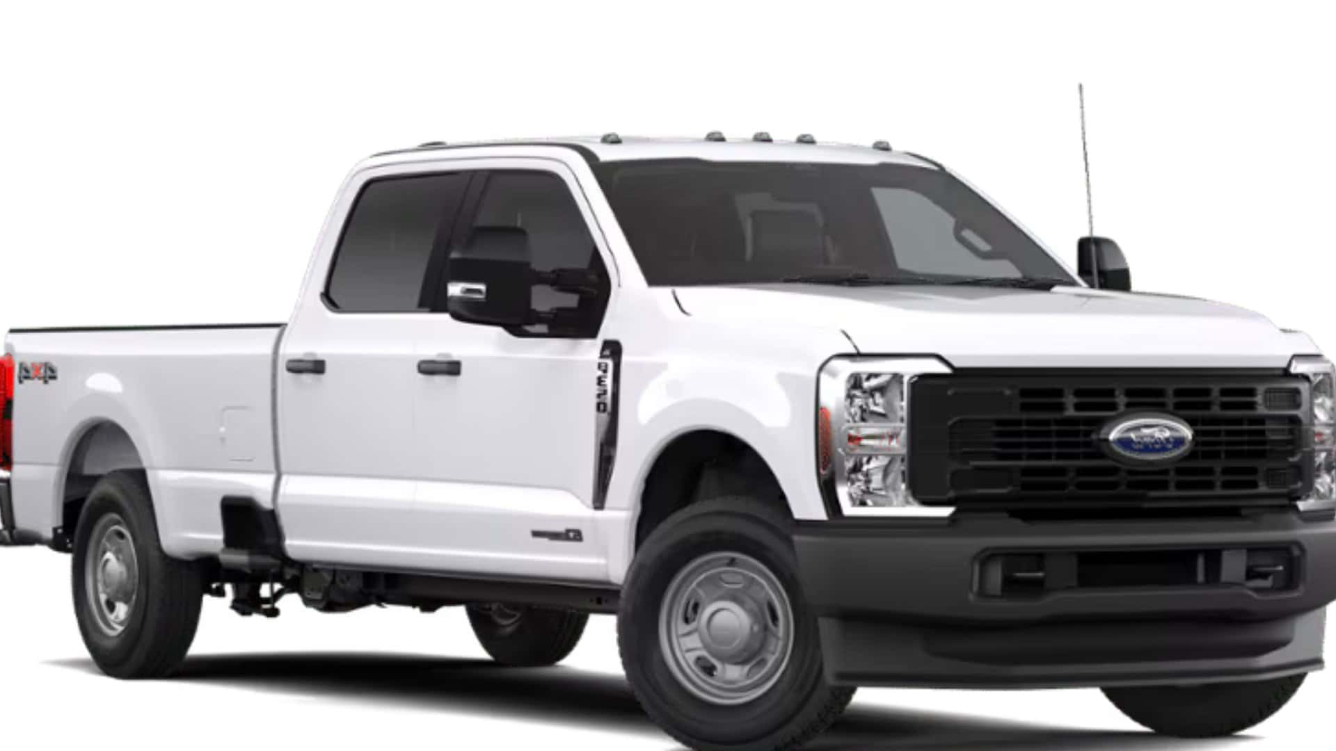 2026 Ford F-350SD XLT white Super Duty pickup shown in front three-quarter studio view with black grille.