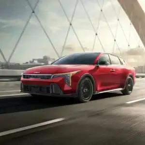 2026 Kia K4 Driving on a Bridge