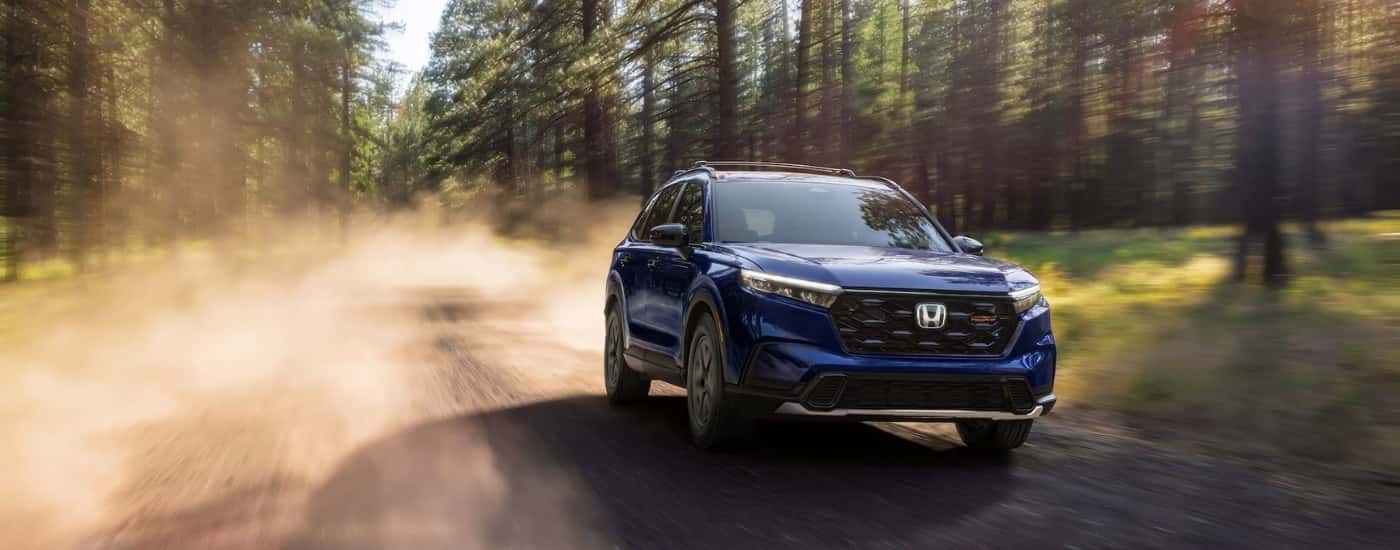 A blue 2026 Honda CR-V from the front after leaving a Honda dealer near University Park.