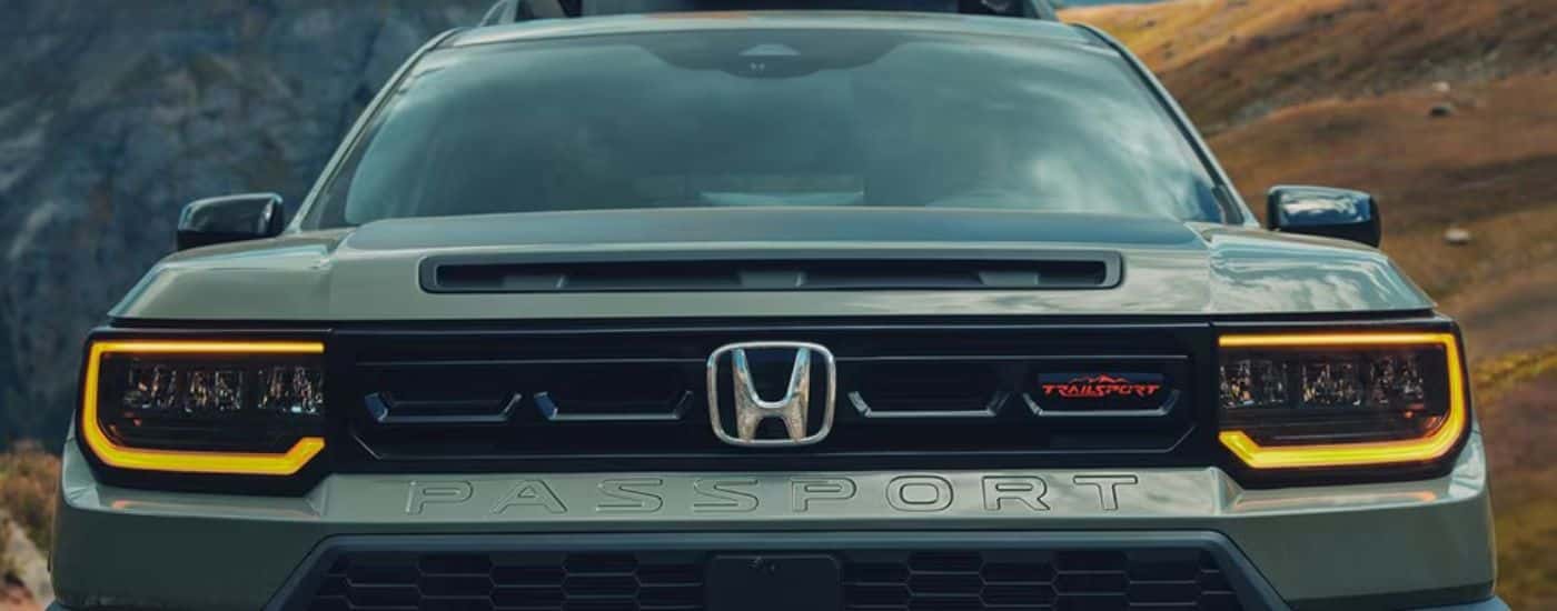 Green 2026 Honda Passport Trailsport edition close up of front grille.