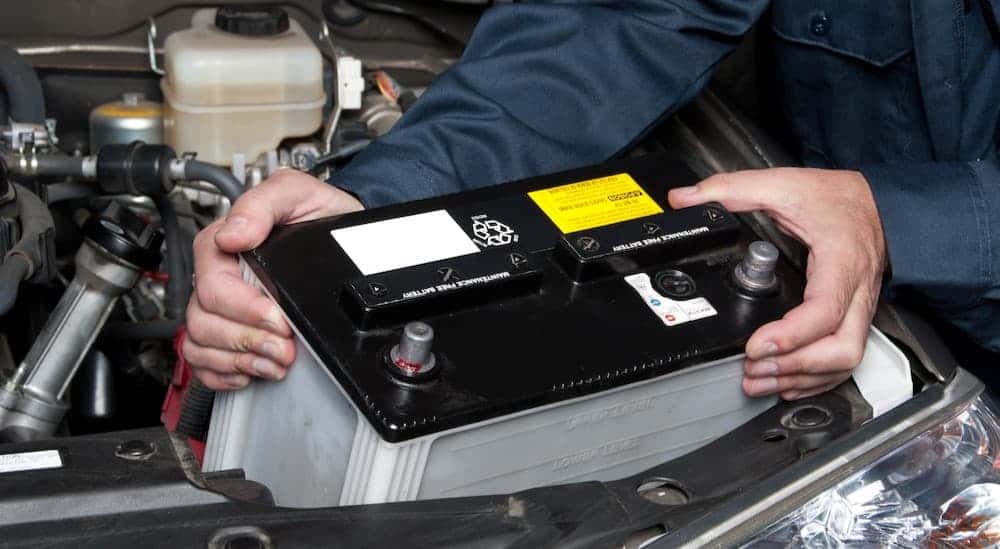 A technician changing a battery.