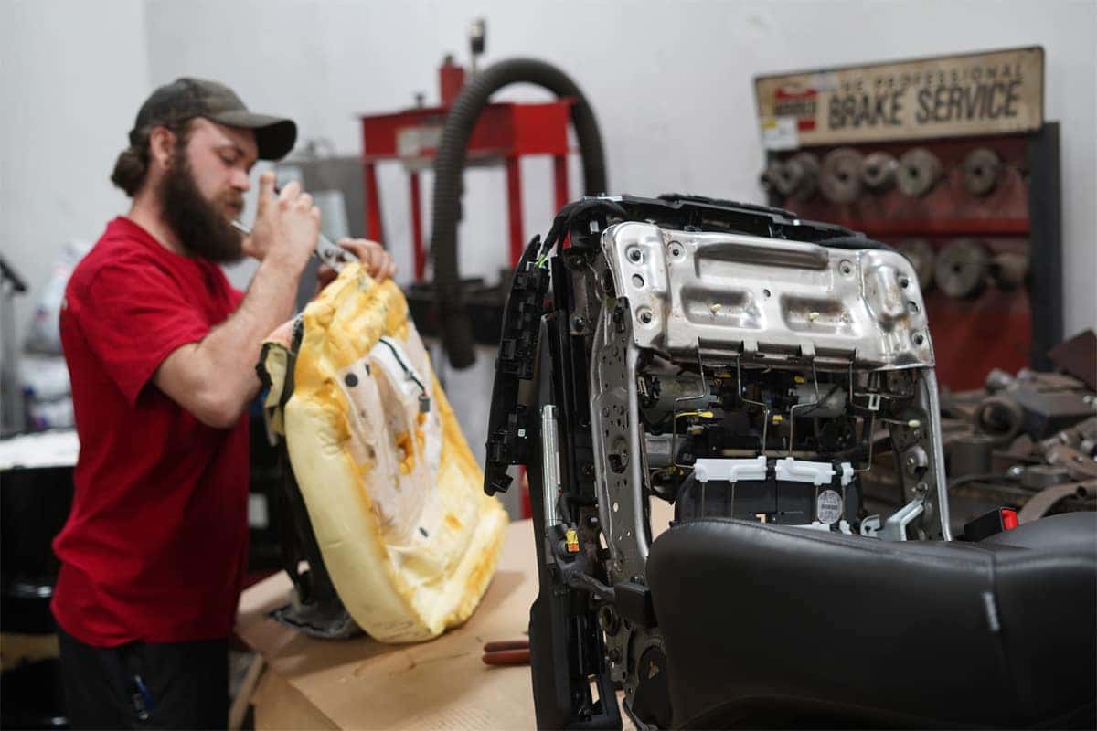 person repairing seats