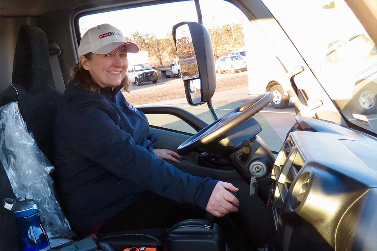 person driving cab over