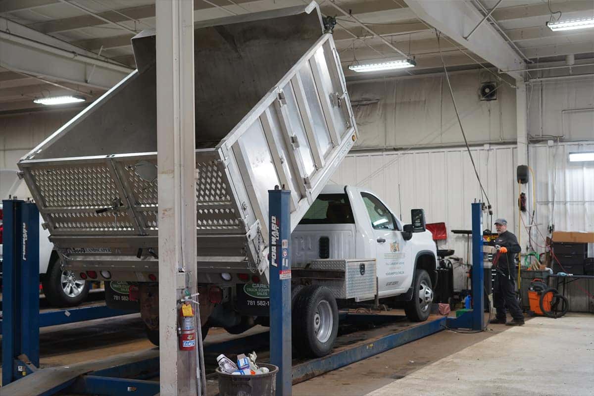 commercial truck on lift with bed raised