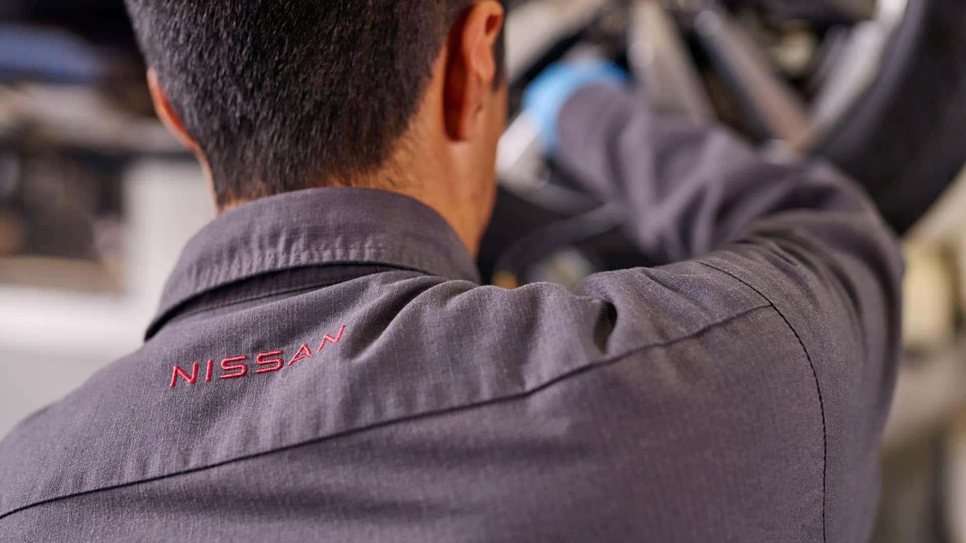 service tech working on tire