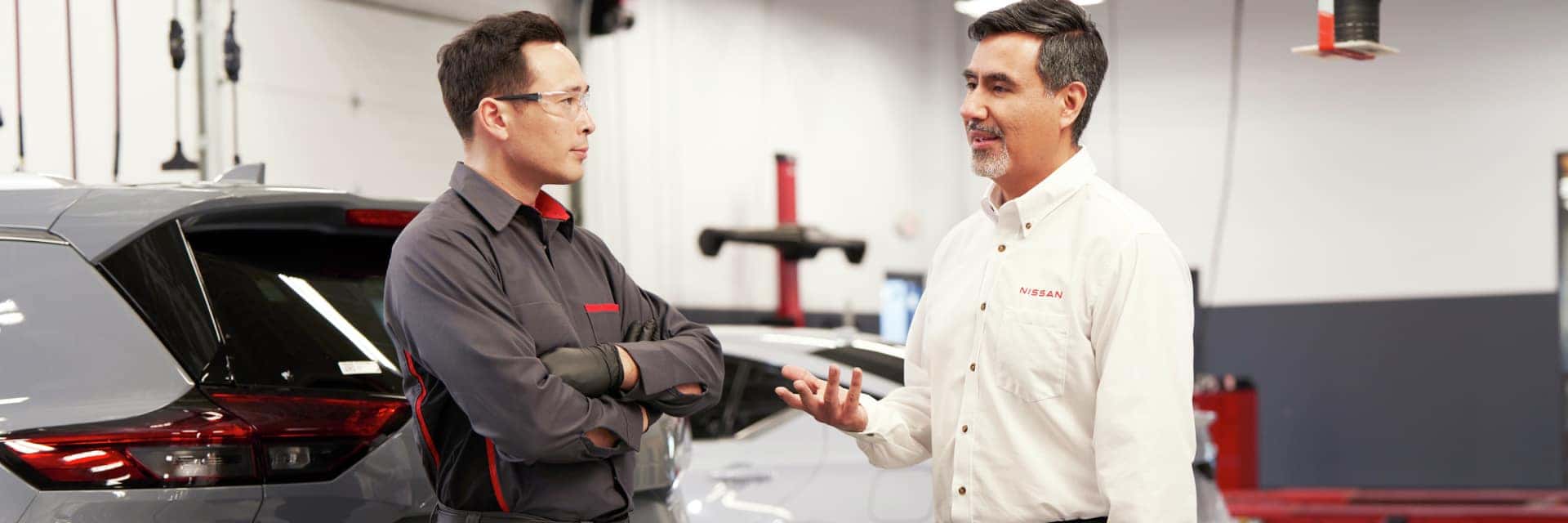 service tech talking with coworker