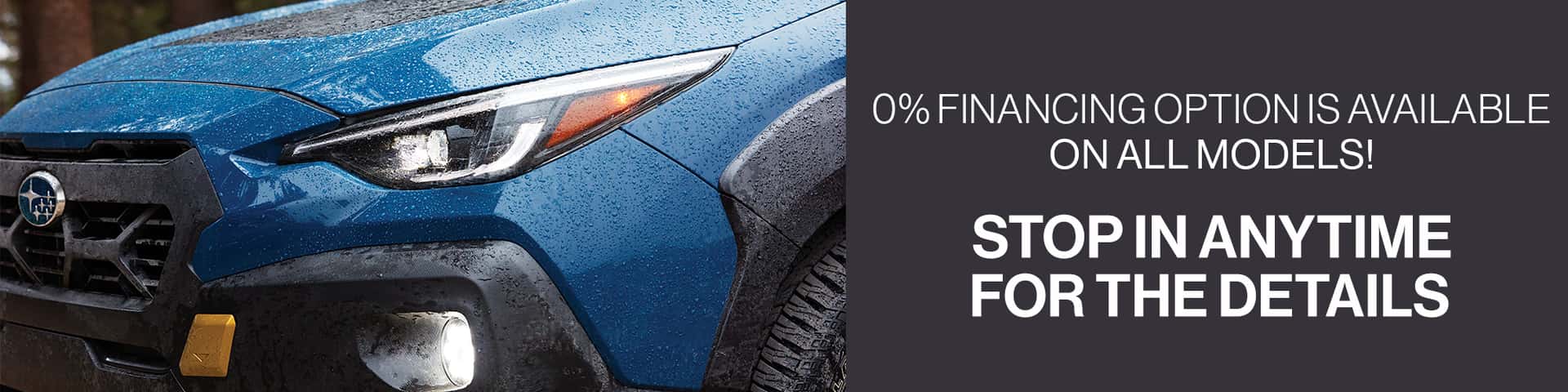 Blue Subaru Crosstrek with grey background and white font