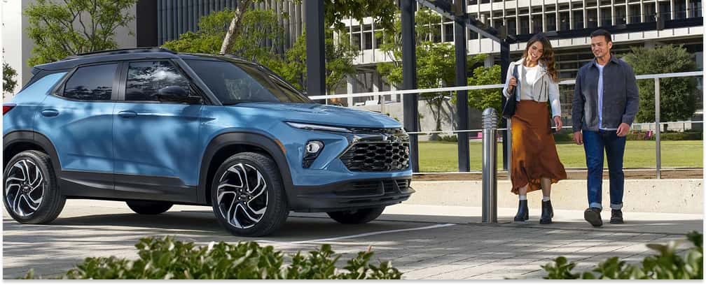 2026 Chevrolet Trailblazer Parked Alongside Happy, Smiling Couple