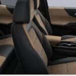Interior view of a 2026 Chevrolet Equinox featuring two-tone black and tan seating.